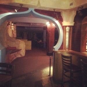 Archway and seating inside restaurant