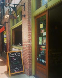 Front door with chalkboard sign