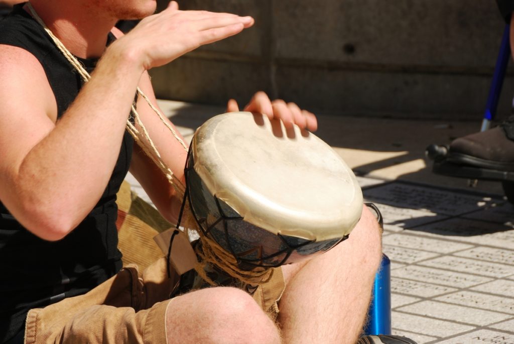 Person playing hand drums