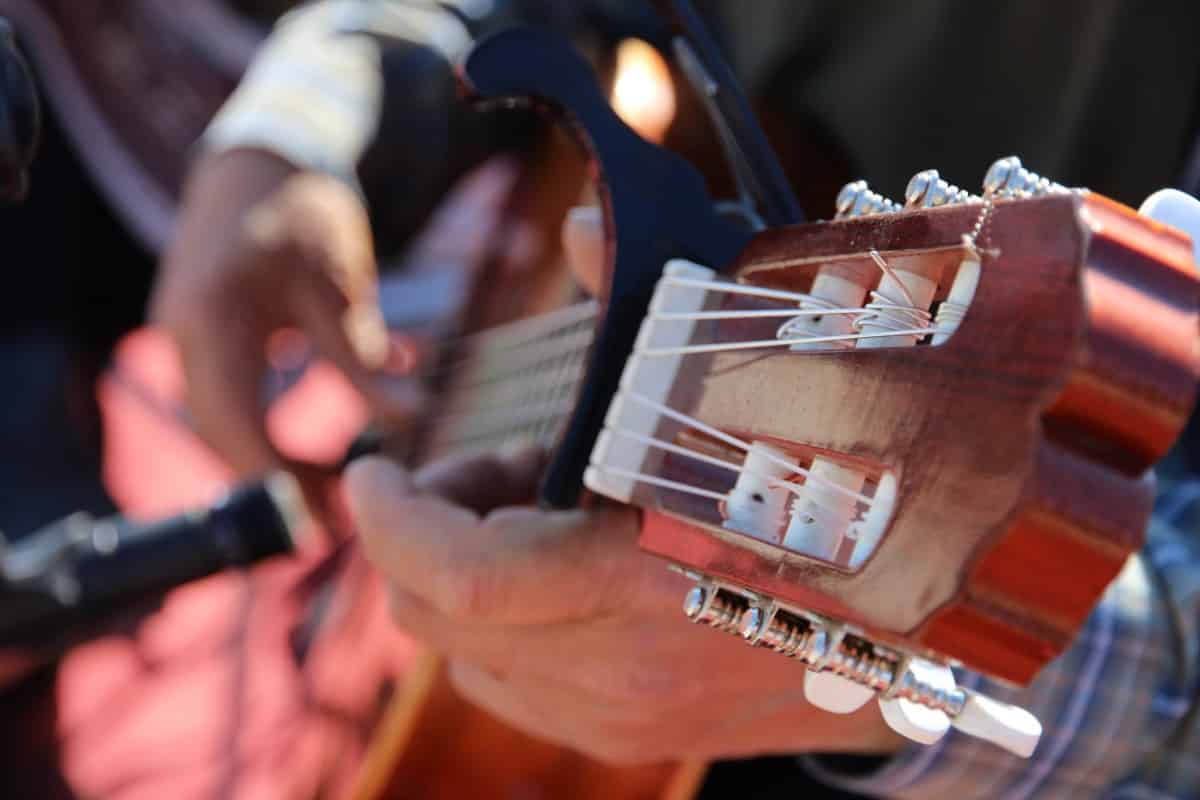 Hand strumming guitar