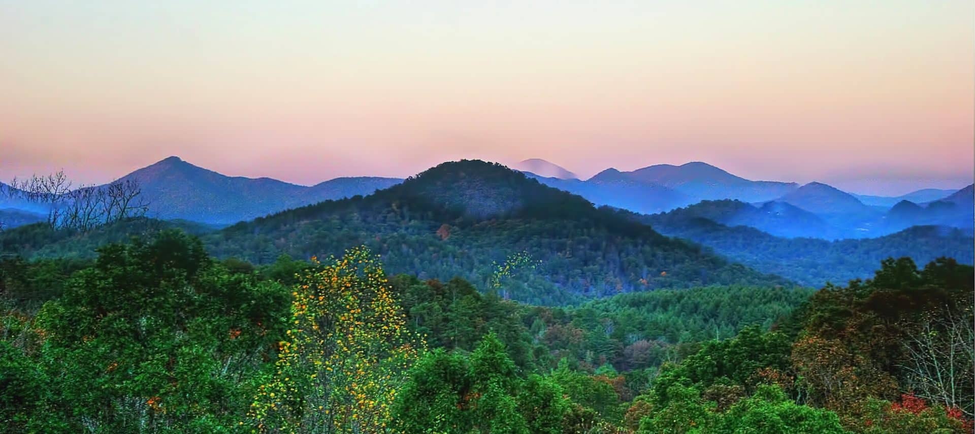 View of sun rising over the Blue Ridge Mountains