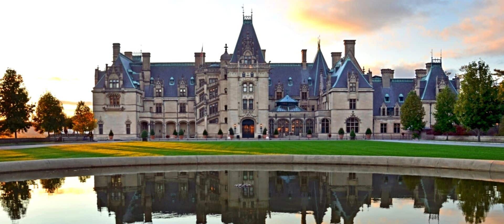 View of Biltmore Estate with reflection in the water