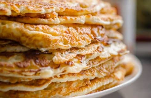Stack of freshly made golden brown pancakes